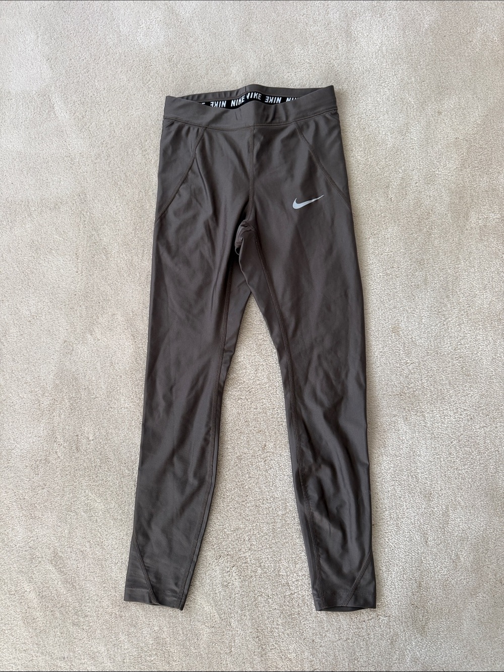 Nike Women’s Gold Athletic Leggings with Silver Swoosh